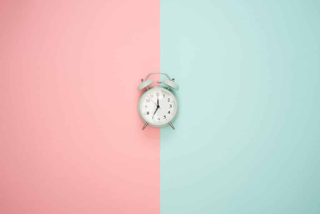 Time management tools and techniques symbolized by a clock