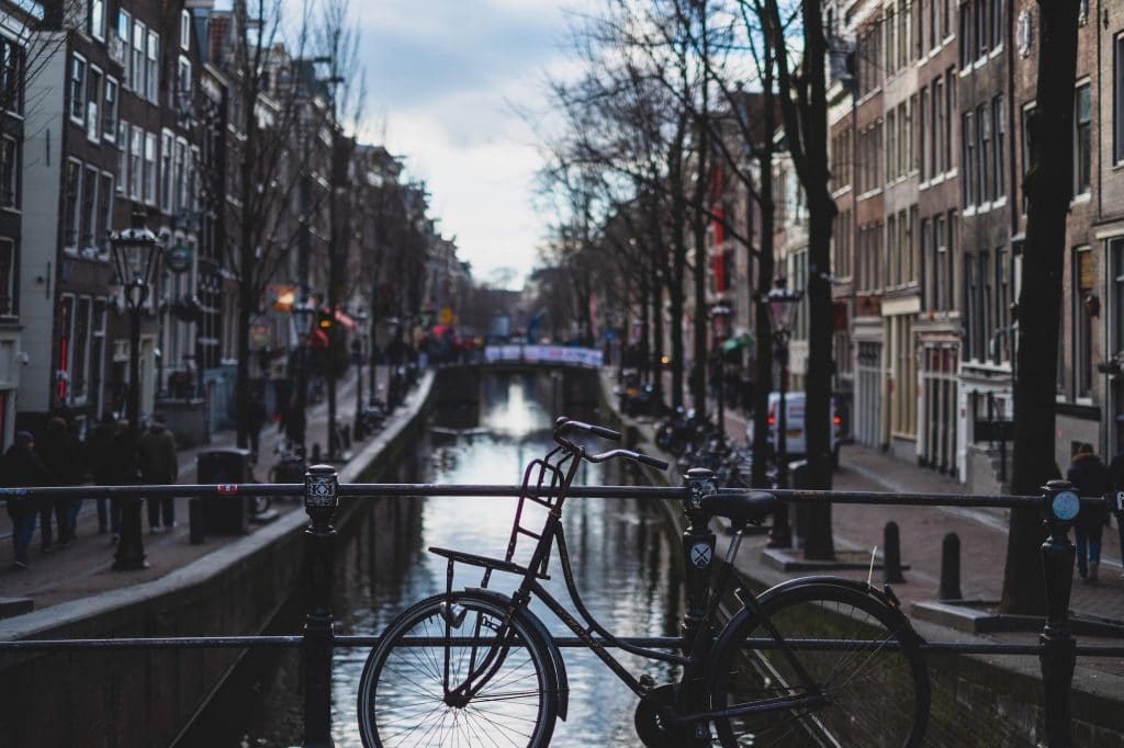 bike parked on bridge in Amsterdam street