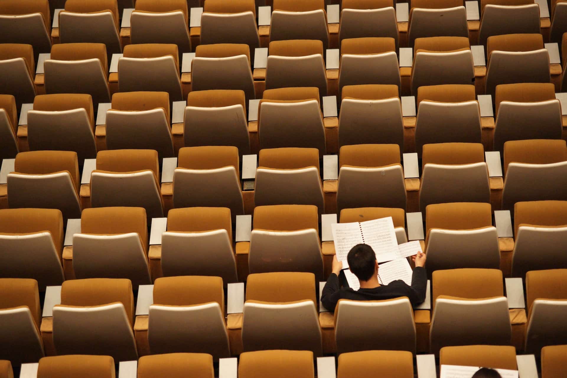 Student academic success studying in empty lecture theater