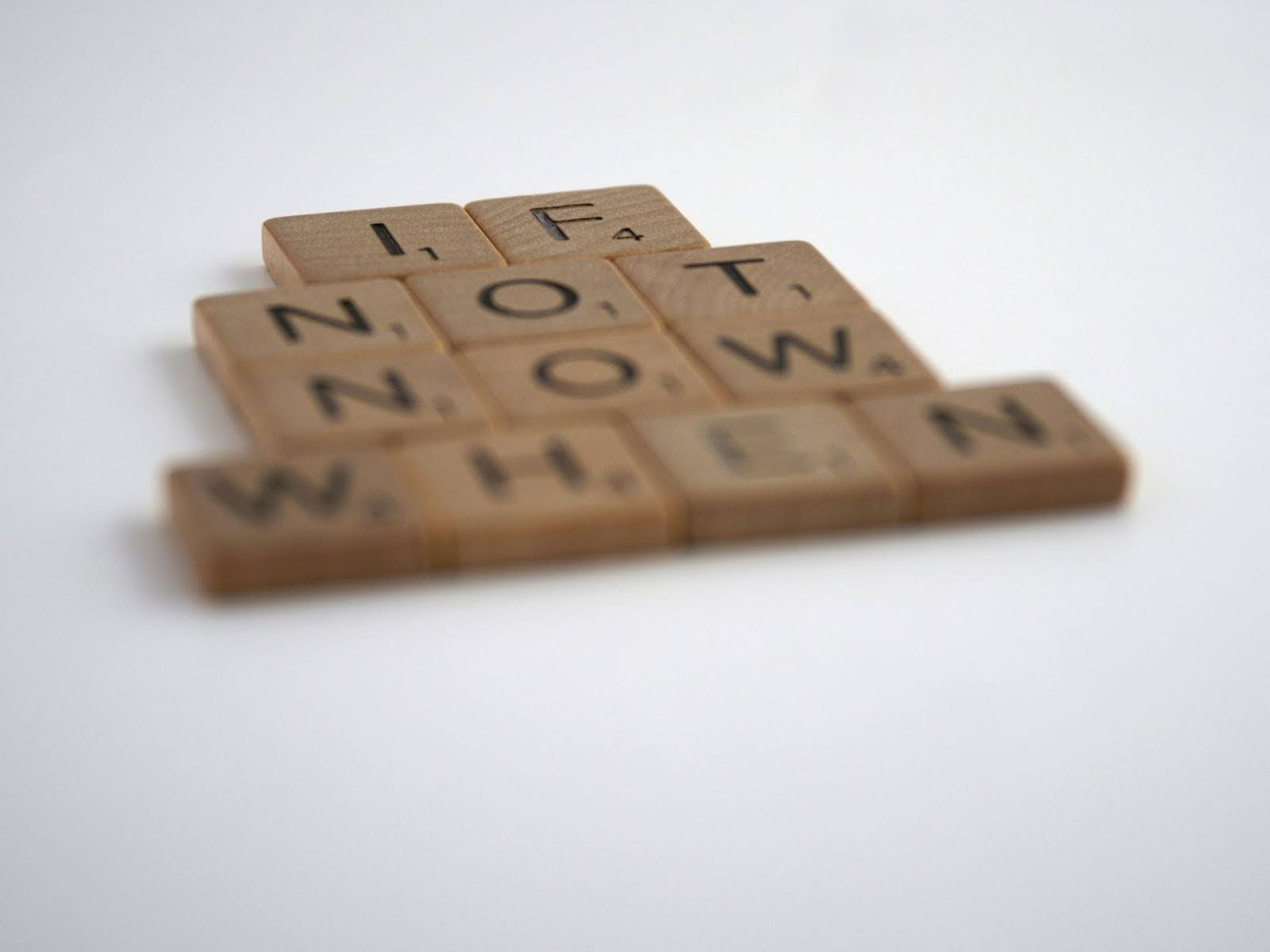 Word blocks spelling out the phrase "If Not Now When?"