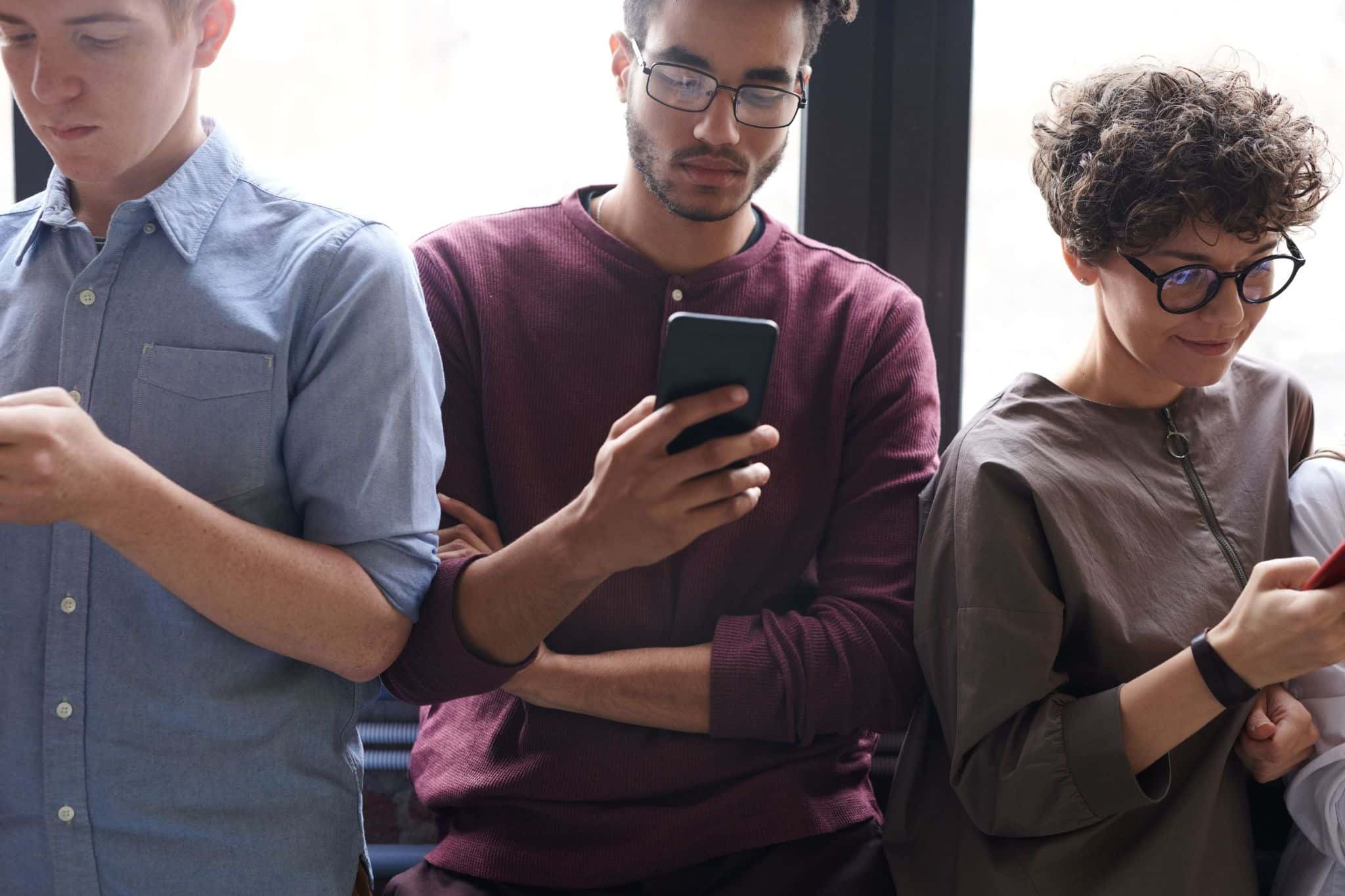 Young knowledge workers on phones